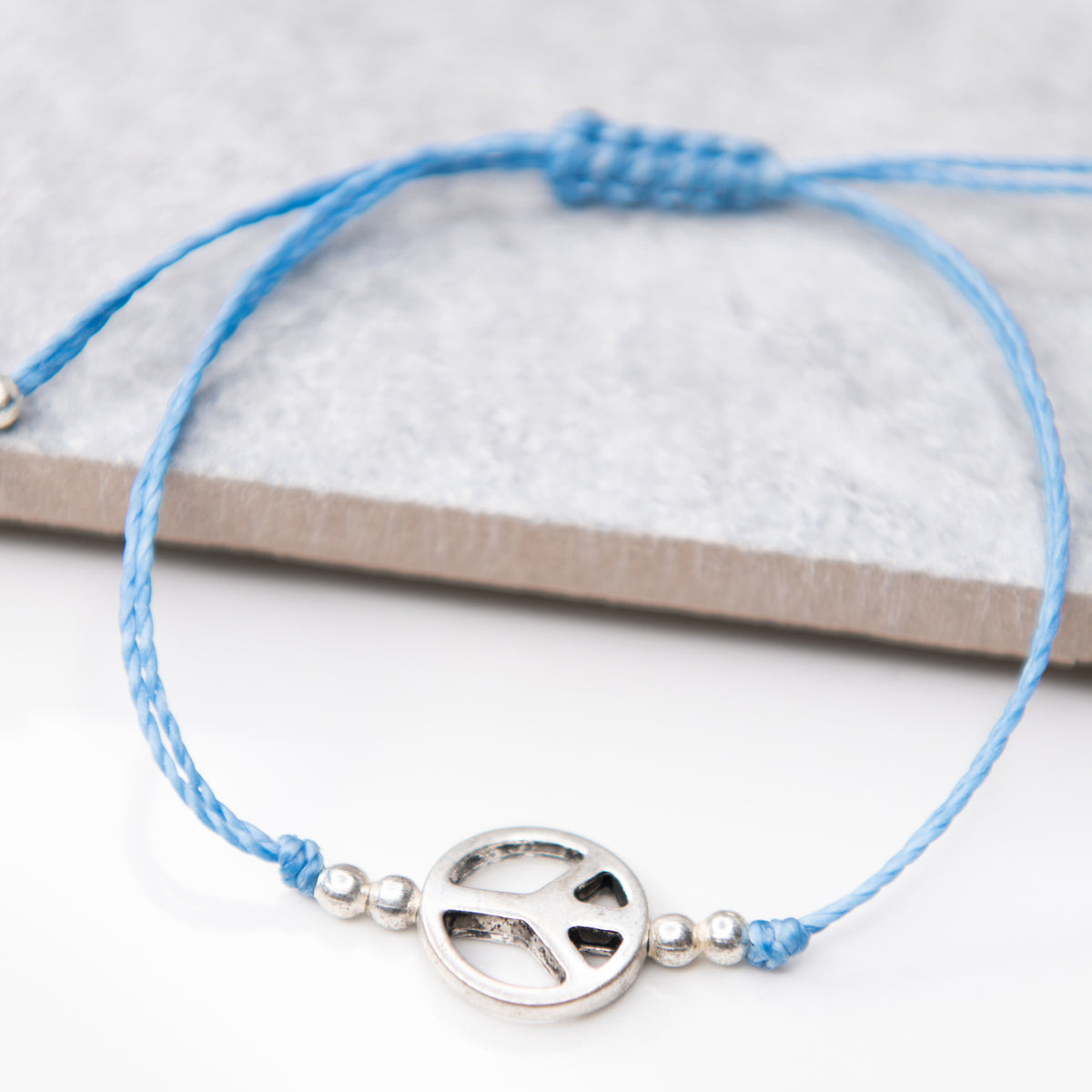 Peace String Charm Bracelet