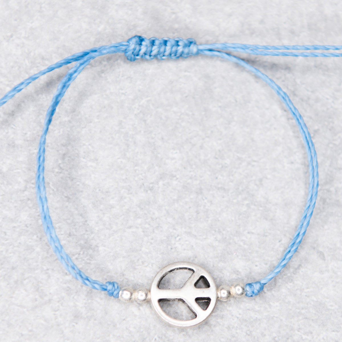 Peace String Charm Bracelet